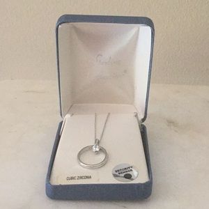 Silver circle and cubic zirconia charm necklace